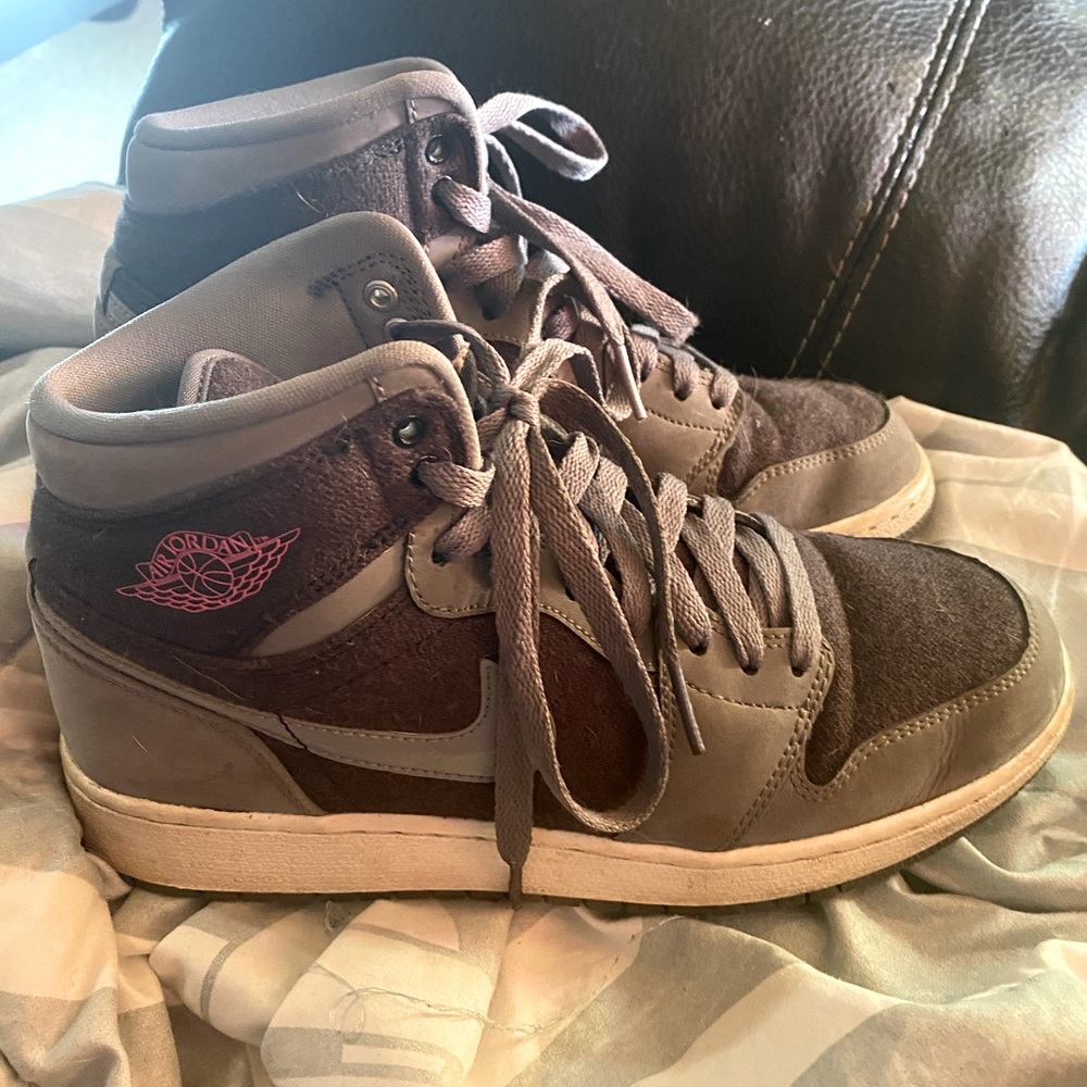 gray black and pink nike jordan's